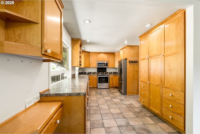 6750 SW Parkwest Ln, Portland, OR 97225 - kitchen with stainless steel appliances, a sink, recessed lighting, open shelves, and dark countertops