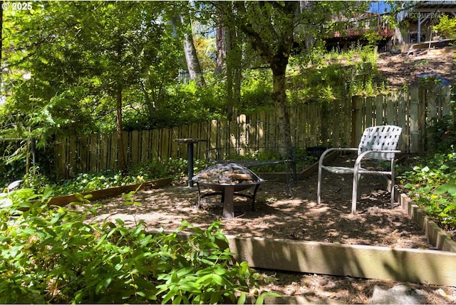 6750 SW Parkwest Ln, Portland, OR 97225 - view of yard with a fire pit