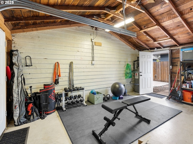 121 NE Edison St, Hillsboro, OR 97124 - exercise area featuring lofted ceiling, strapped water heater, and wood ceiling