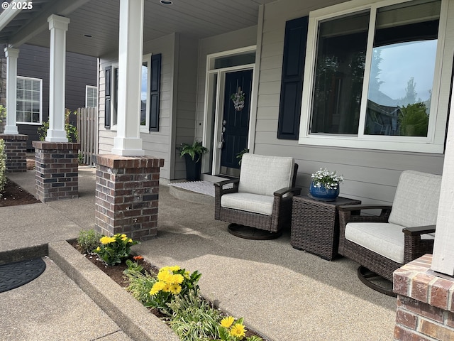 view of patio featuring covered porch