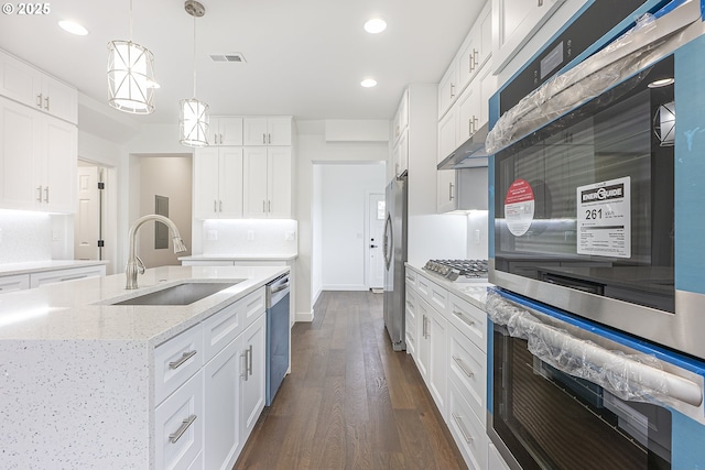 413 S Trade St, Amity, OR 97101 - kitchen with a sink, stainless steel appliances, dark wood-type flooring, recessed lighting, and pendant lighting