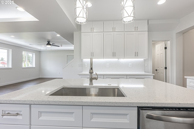 413 S Trade St, Amity, OR 97101 - kitchen featuring stainless steel dishwasher, a sink, white cabinetry, a raised ceiling, and recessed lighting
