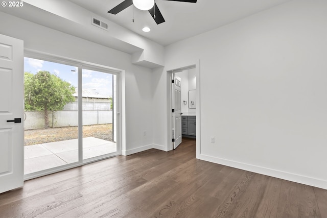 413 S Trade St, Amity, OR 97101 - spare room with a ceiling fan, dark wood-style flooring, baseboards, and recessed lighting