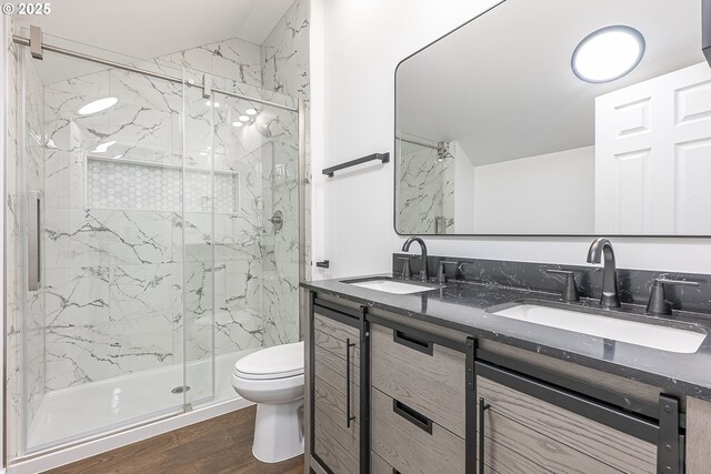 413 S Trade St, Amity, OR 97101 - full bathroom with toilet, double vanity, a marble finish shower, wood finished floors, and lofted ceiling