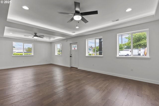 413 S Trade St, Amity, OR 97101 - empty room featuring a raised ceiling, ceiling fan, dark wood finished floors, baseboards, and recessed lighting