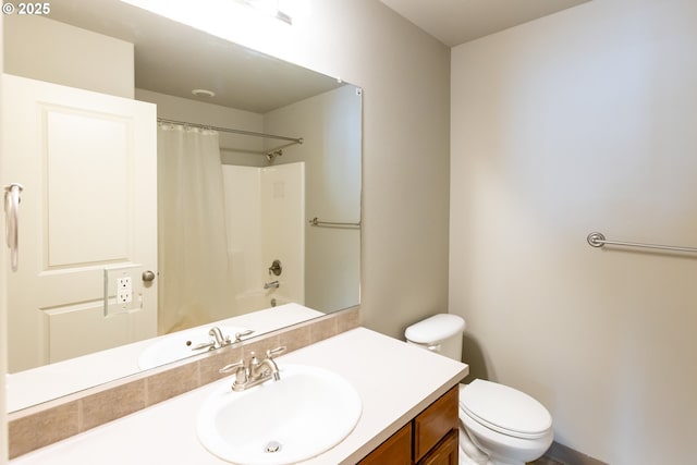 full bath with vanity and toilet