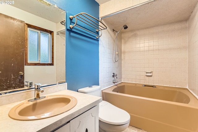 full bathroom with  shower combination, vanity, and toilet