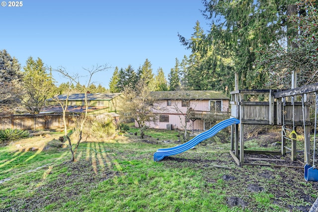 view of play area featuring fence