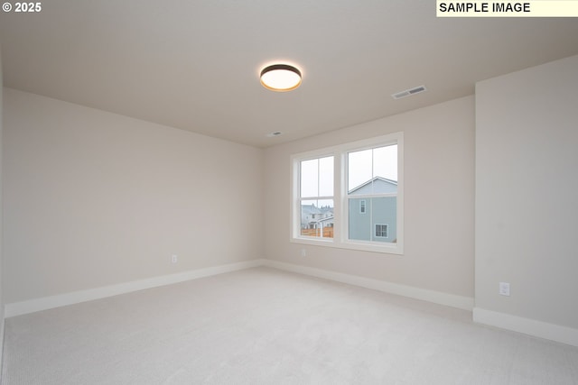 view of carpeted spare room