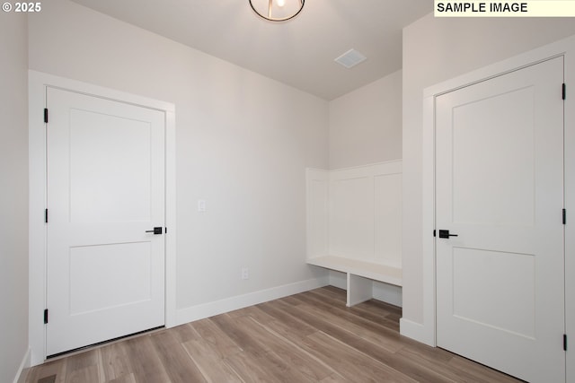 mudroom with light wood-type flooring