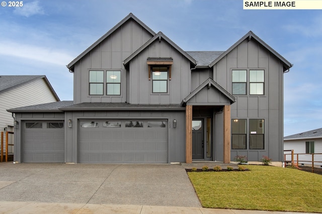 modern farmhouse style home featuring a garage and a front lawn