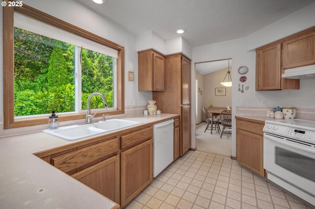 8911 SW 49th Ave, Portland, OR 97219 - kitchen featuring white appliances, light countertops, under cabinet range hood, recessed lighting, and brown cabinets