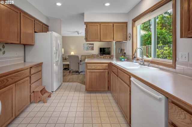8911 SW 49th Ave, Portland, OR 97219 - kitchen with white appliances, open floor plan, light countertops, a peninsula, and recessed lighting