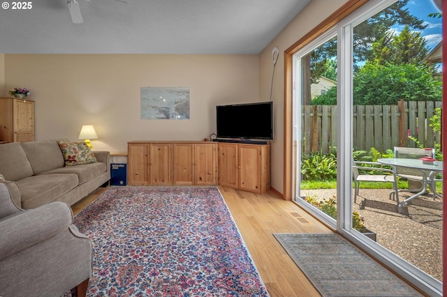 8911 SW 49th Ave, Portland, OR 97219 - living room featuring light wood finished floors and ceiling fan
