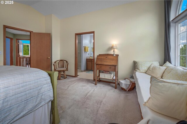 8911 SW 49th Ave, Portland, OR 97219 - bedroom featuring light colored carpet, lofted ceiling, and ensuite bath
