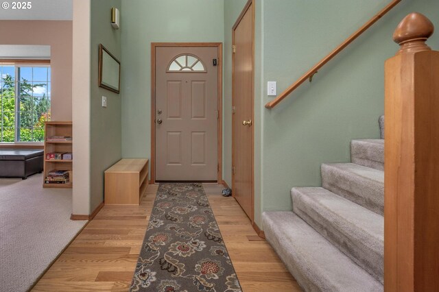 8911 SW 49th Ave, Portland, OR 97219 - foyer with stairs and light wood finished floors