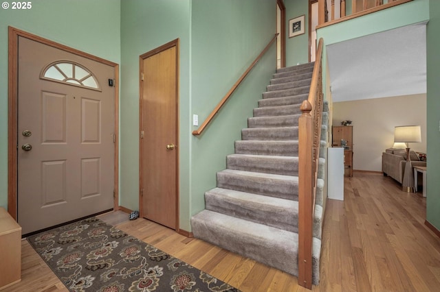 8911 SW 49th Ave, Portland, OR 97219 - entryway featuring wood finished floors and stairway