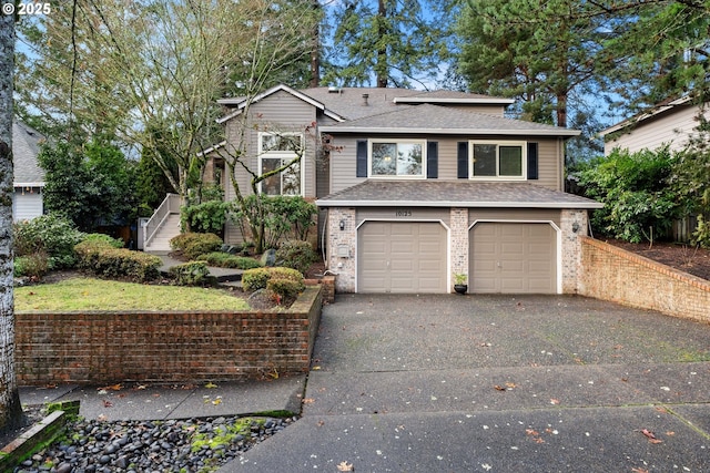 view of front of property with a garage