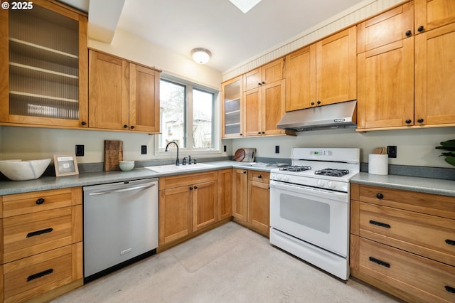 kitchen featuring under cabinet range hood, a sink, stainless steel dishwasher, white gas range oven, and glass insert cabinets