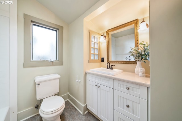 full bath with baseboards, toilet, lofted ceiling, vanity, and a shower