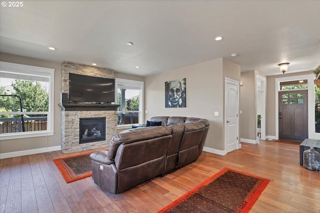 2871 Wing Tip Ave, Salem, OR 97304 - living room featuring wood-type flooring and a fireplace