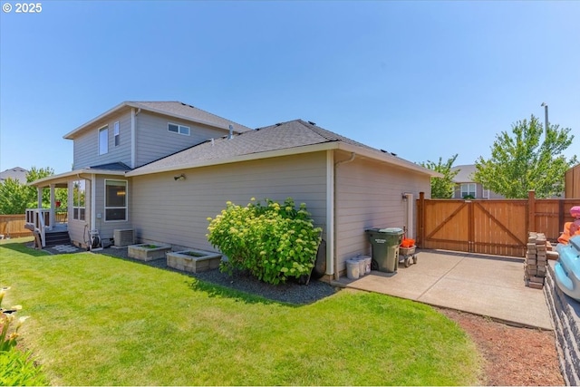 2871 Wing Tip Ave, Salem, OR 97304 - back of property featuring a patio area and a gate