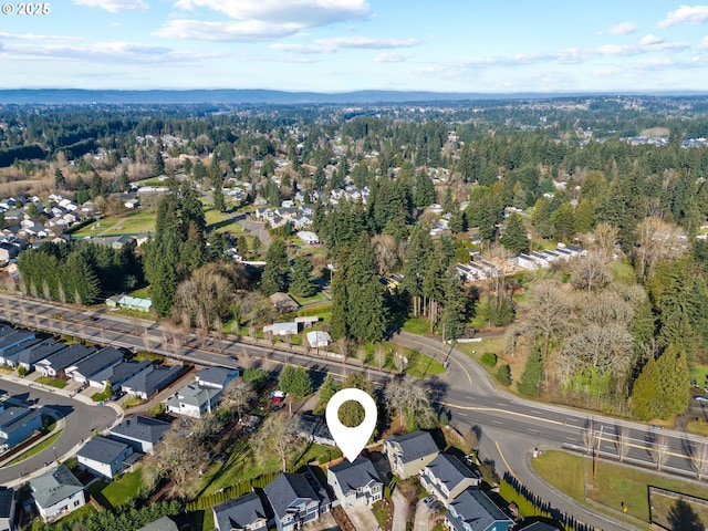 birds eye view of property with a residential view