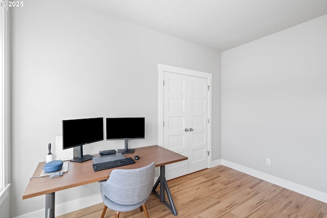 office with baseboards and wood finished floors