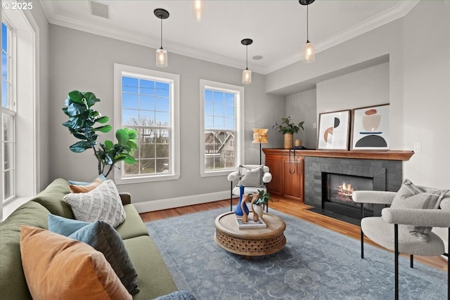 interior space with ornamental molding and light wood-type flooring