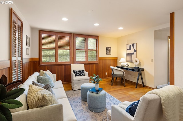 2112 Agate St, Eugene, OR 97403 - living area featuring a wainscoted wall, wood walls, wood finished floors, plenty of natural light, and recessed lighting