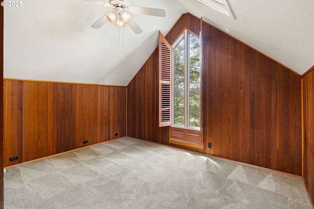2112 Agate St, Eugene, OR 97403 - additional living space featuring wood walls, lofted ceiling, a ceiling fan, and carpet flooring