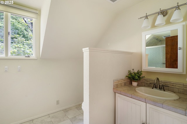 2112 Agate St, Eugene, OR 97403 - full bathroom with vanity, vaulted ceiling, and an enclosed shower