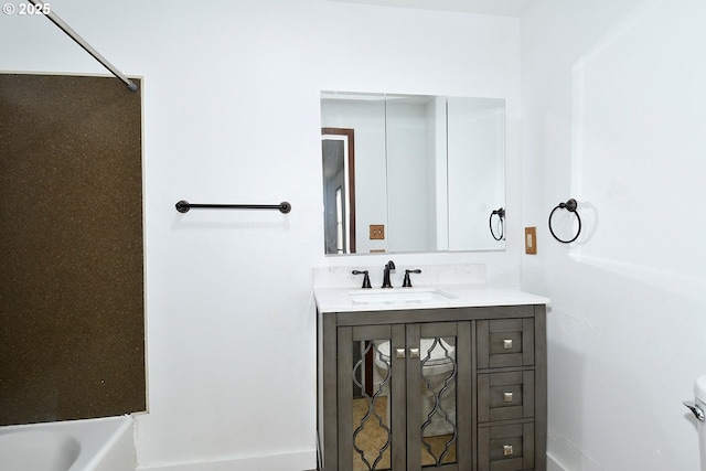 bathroom with vanity, a bathtub, and walk in shower