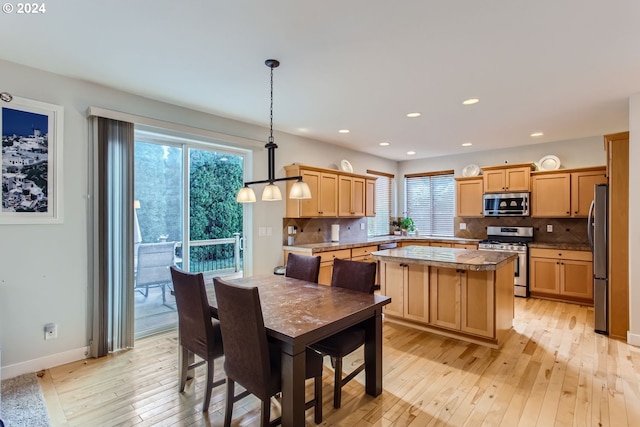 dining area featuring light hardwood / wood-style flooring