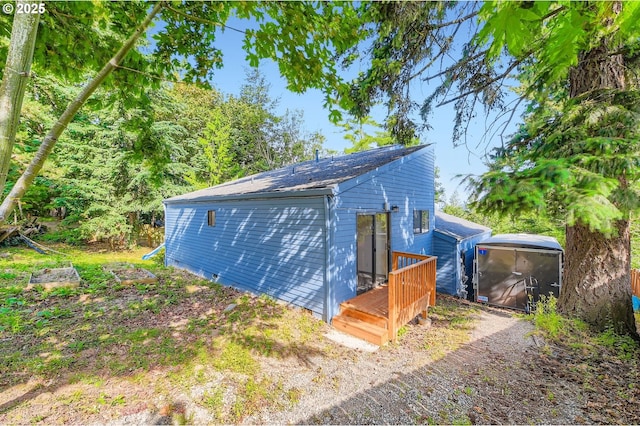 12140 SE Henderson Dr, Portland, OR 97266 - view of side of property featuring a deck