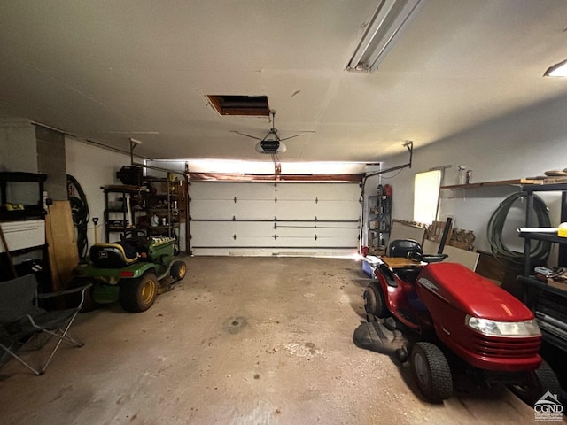 garage featuring a garage door opener