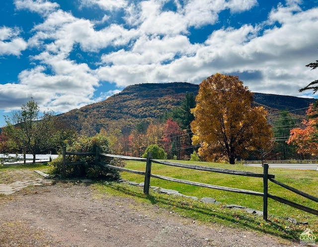 mountain view featuring a rural view