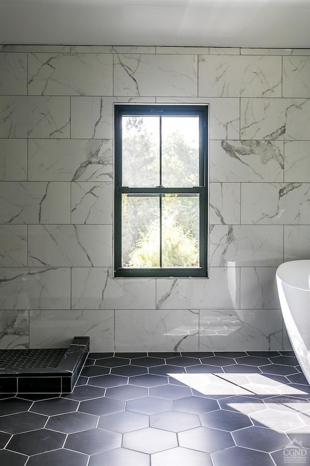 bathroom featuring independent shower and bath and tile walls