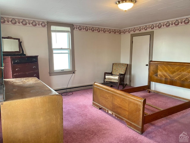 carpeted bedroom featuring baseboard heating