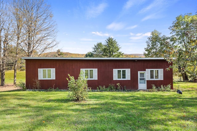 exterior space with a lawn