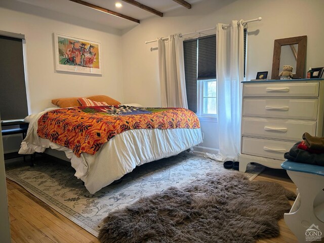 bedroom featuring dark wood-type flooring