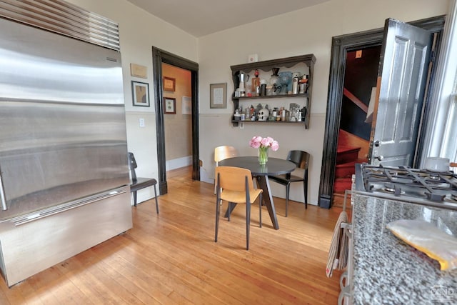 dining space featuring light hardwood / wood-style flooring