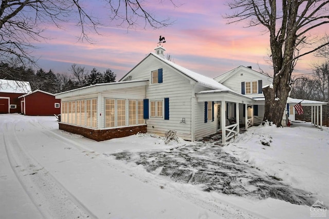 view of snow covered property