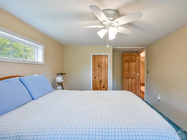 bedroom featuring a closet and ceiling fan