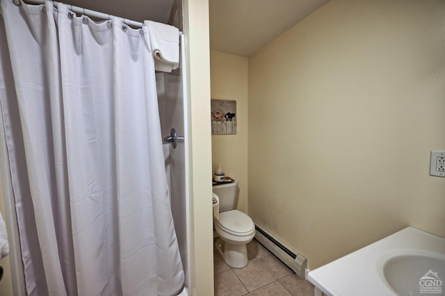 bathroom featuring toilet, tile patterned flooring, a baseboard radiator, and sink