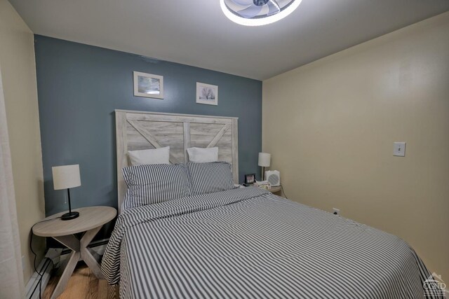 bedroom featuring hardwood / wood-style flooring