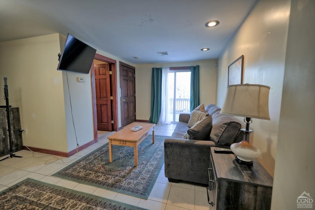 living room with light tile patterned floors