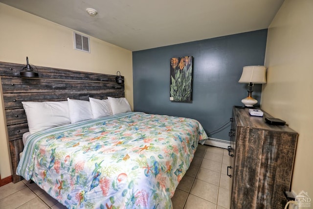 tiled bedroom featuring baseboard heating