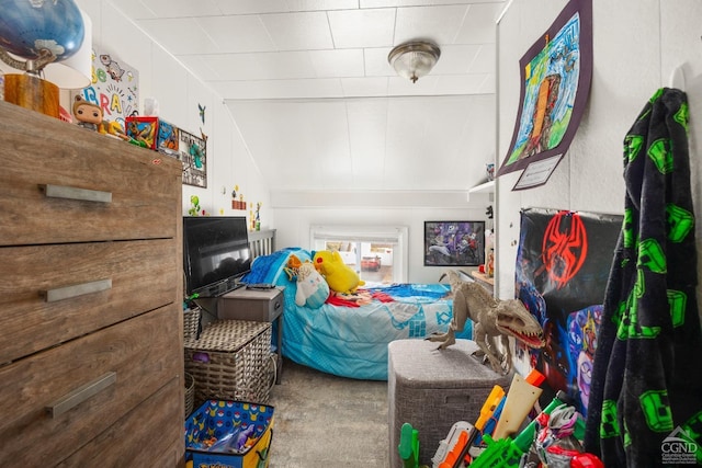 carpeted bedroom featuring vaulted ceiling