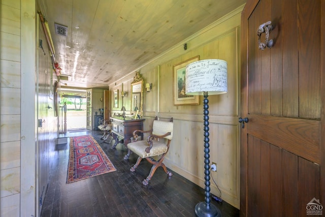 interior space featuring hardwood / wood-style floors, wood walls, and wood ceiling